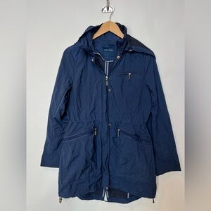 Cole Haan packable hooded rain jacket in navy blue gold